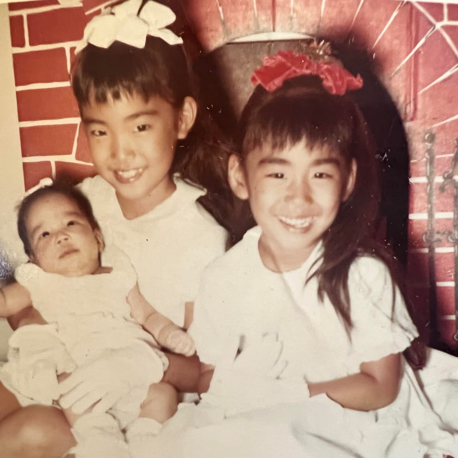 Michele with her two younger sisters.