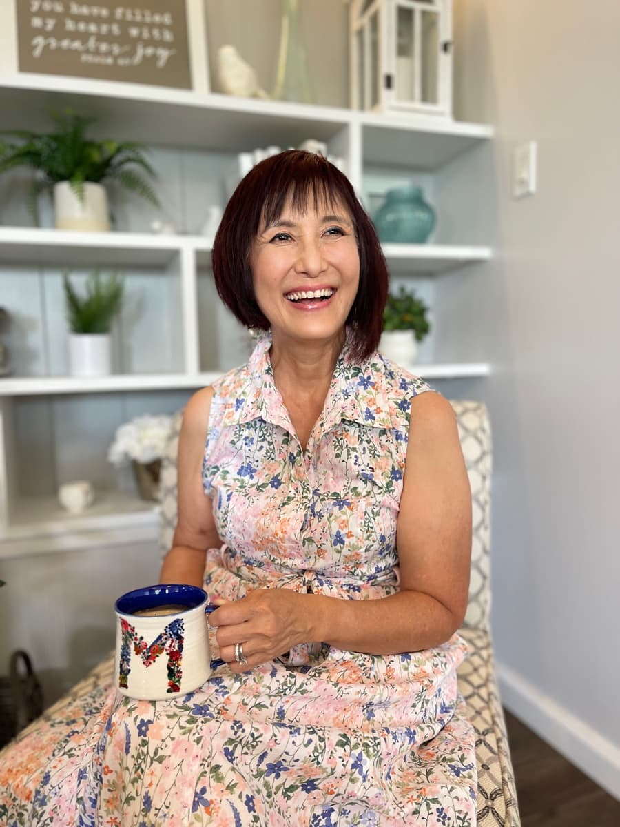 Michele Okimura laughing at home